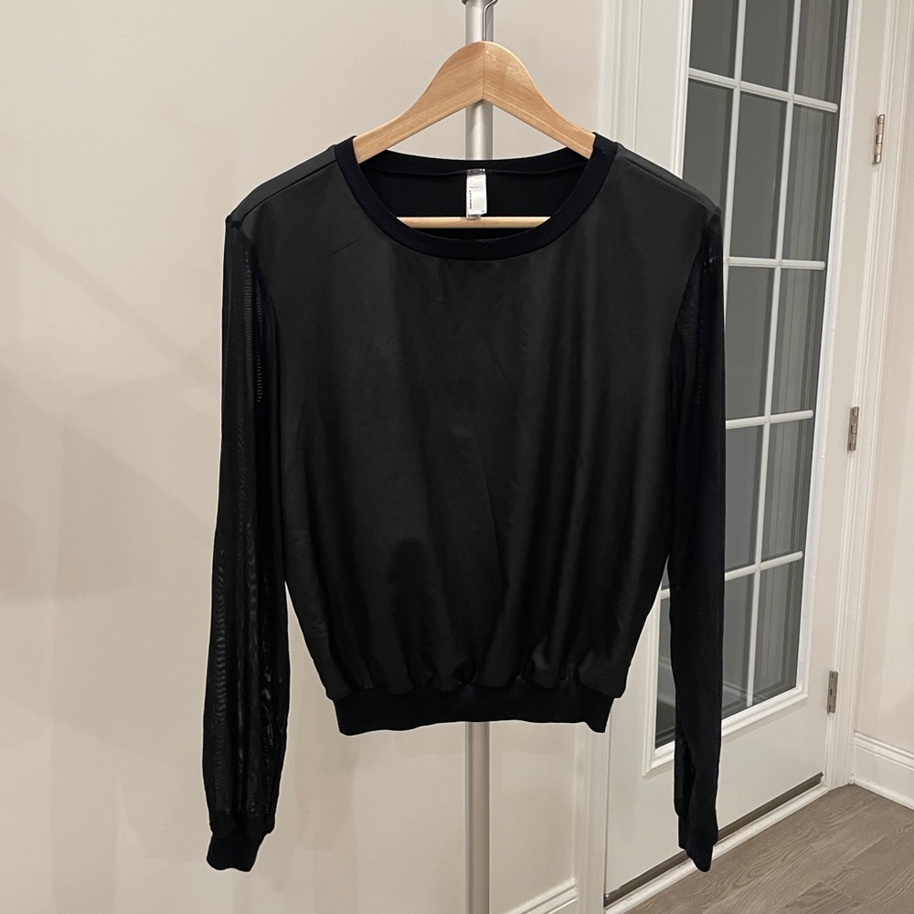 American Apparel black top with transparent sleeve